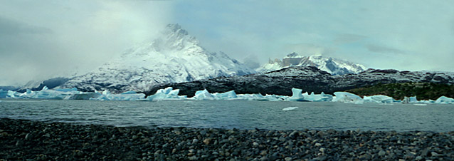 Panoramic view from the terminal moraine that ends the lake